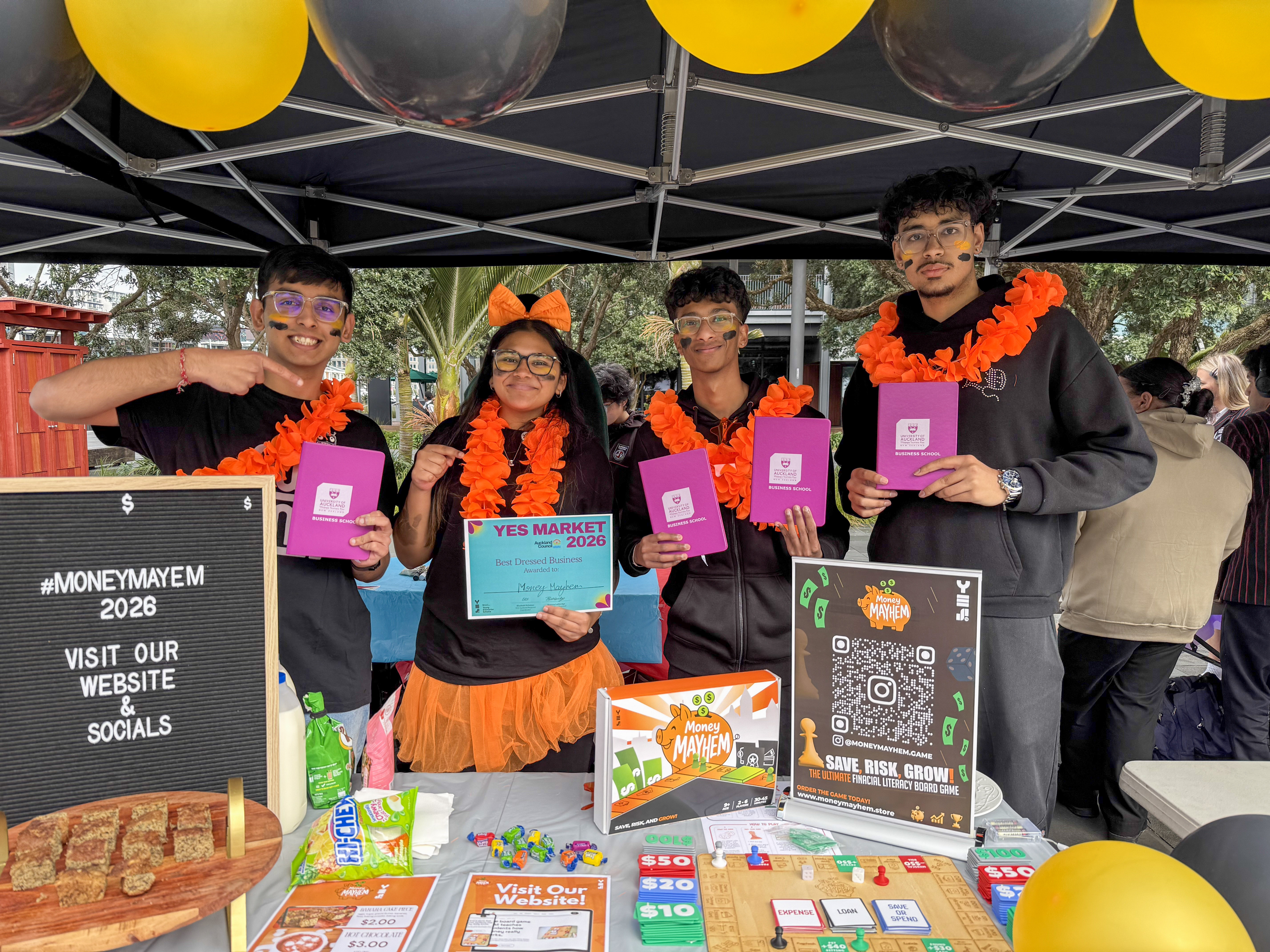 Money Mayhem team receiving Best Dressed Business at YES Market Day 2026